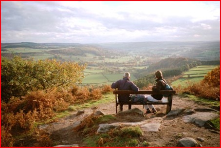 Peter and Larry watching the sun start to fade over Chatsworth from the seat by the Wellington Monument.