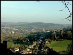 Having left the Cotswold Way we could see in the valley the village of Middleyard with the outskirts of Stroud beyond .