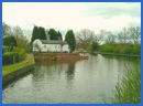 One of the cottages with a Barrel Roof found along this stretch of the Stratford on Avon Canal .