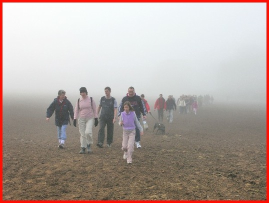 Crossing the field on the way to the radio mast and Croxton Racecourse .