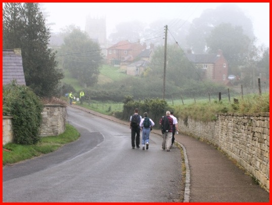 Walking down School Lane before turning left into Chapel Lane .