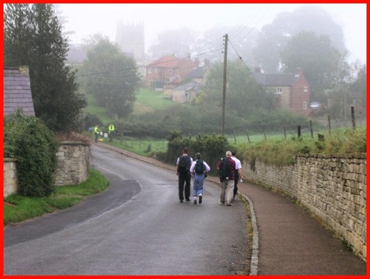 Walking down School Lane before turning left into Chapel Lane .