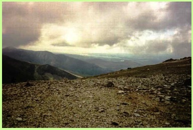 Looking towards Menai Straits from near the top of Pen yr Ole Wen .