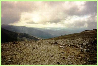 Looking towards Menai Straits from near the top of Pen yr Ole Wen .