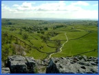 Looking from the top of Malham Cove towards Malham .