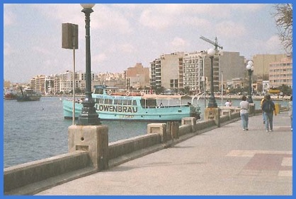 Moored at its berth in Sliema is the ferry, which is a quick and inexpensivee way to get to Valletta and back. In the background is the inevitable crane indicating yet more building work in progress.