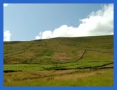 Looking back at our route off Pendle Hill . 