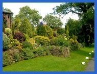 The beautiful garden on the way to Pendle Hill .