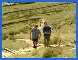 Anne (without trouser legs) and Greg on the rock steps .