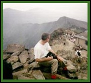 Mick on Snowdon. You can see the back of the cafe on the right.