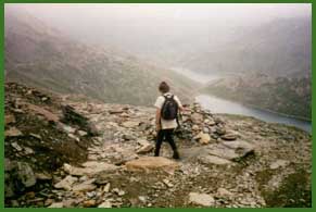 Going down the Pyg Track with Llyn Glasly below and Llydaw in the distance.
