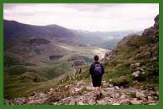 Greg walking towards the Miner's Track, the Snowdon Horseshoe completed.