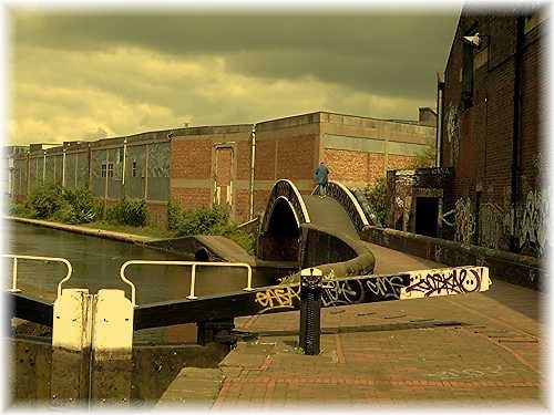 The Grand Union Canal at Bordesley Junction. The Grand Union goes<br /> right, under the bridge, but our route was over the bridge and straight <br />on along the Digbeth Branch Canal.
