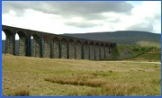 Final view of Whernside and the photogenic Ribblehead Viaduct .